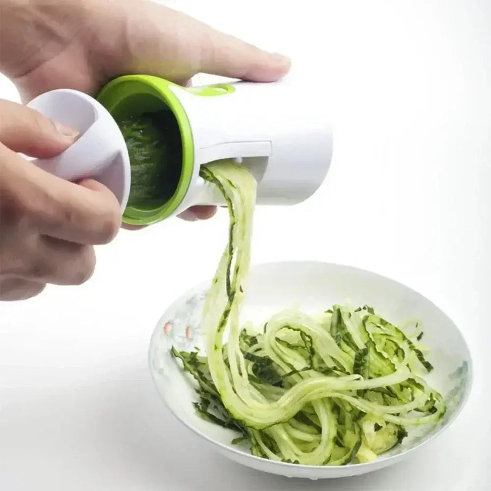 User demonstrating a heavy-duty spiralizer vegetable slicer with zucchini noodles being served in a bowl.