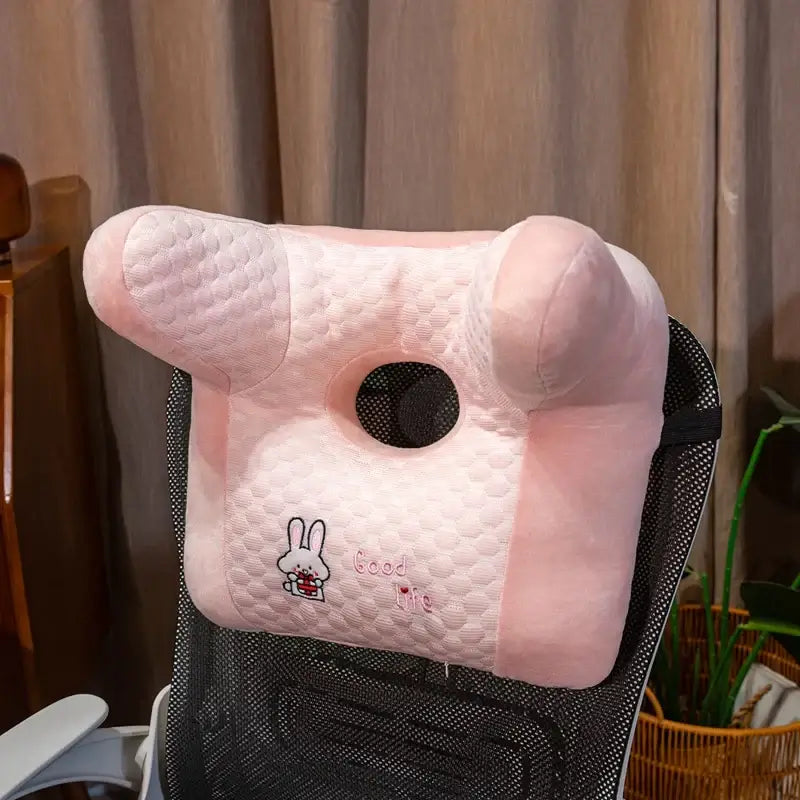 Funny cartoon back sleeper nap pillow in pink, perfect for bed, sofa, or office, with anti-slip bottom and machine washable feature.