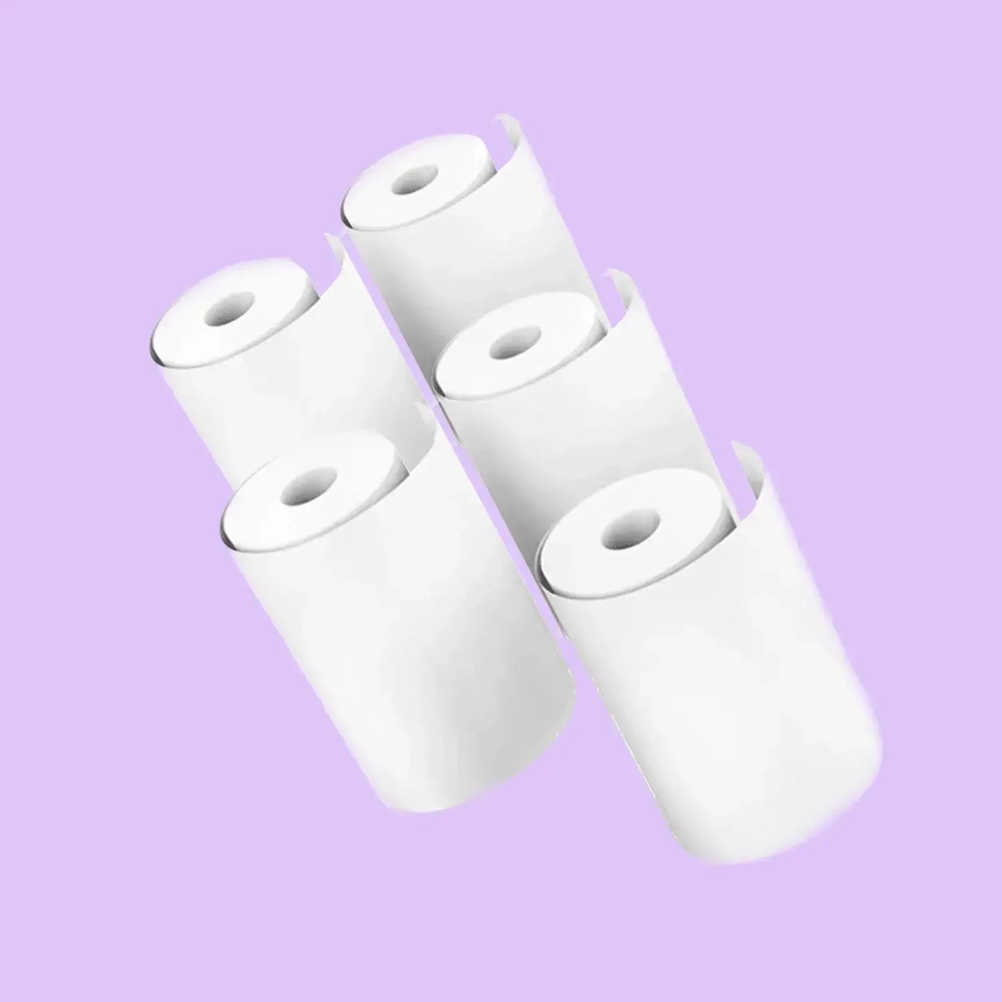 Five rolls of zero ink printer paper for instant print cameras, ideal for capturing and printing memories.