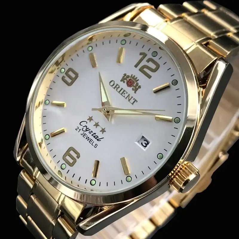 Orient luxury automatic mechanical watch with gold stainless steel band and white dial. Multi-function men's timepiece.