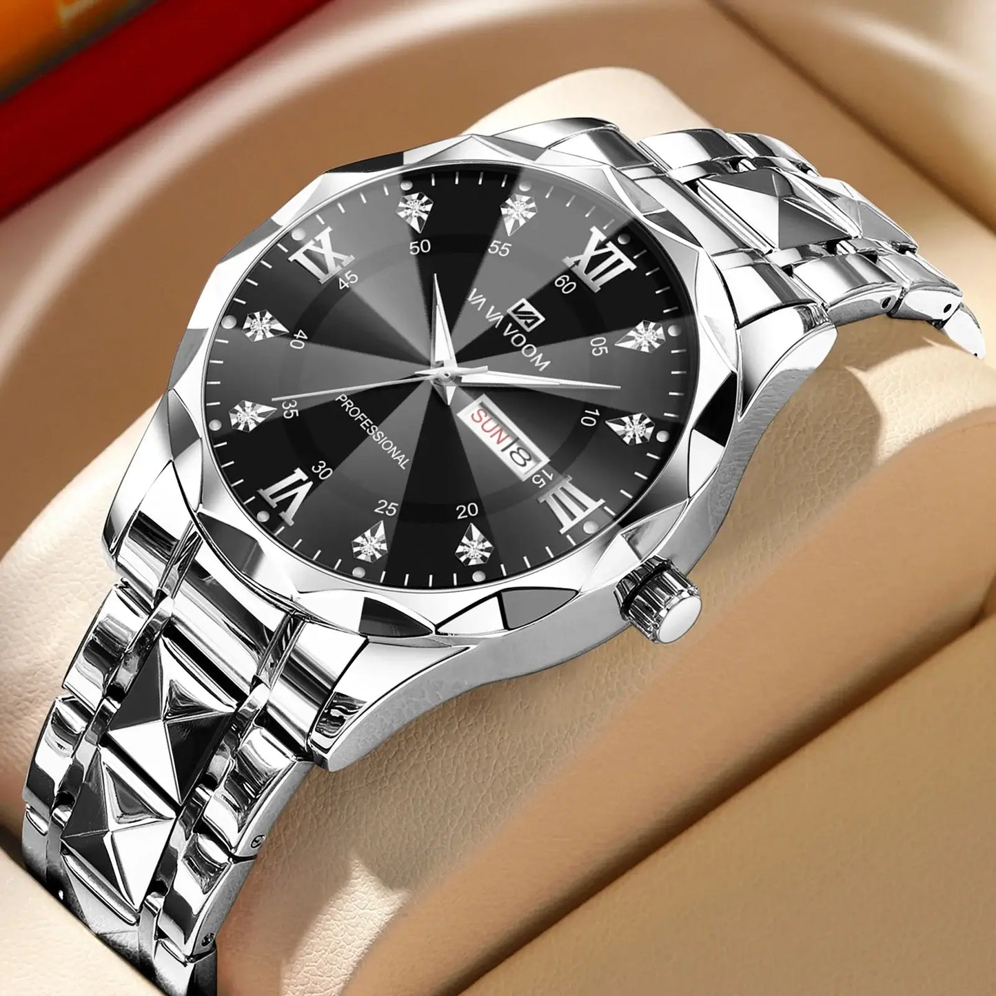 Luxury men's watch with black dial, silver stainless steel band, and date display resting on a cushion.