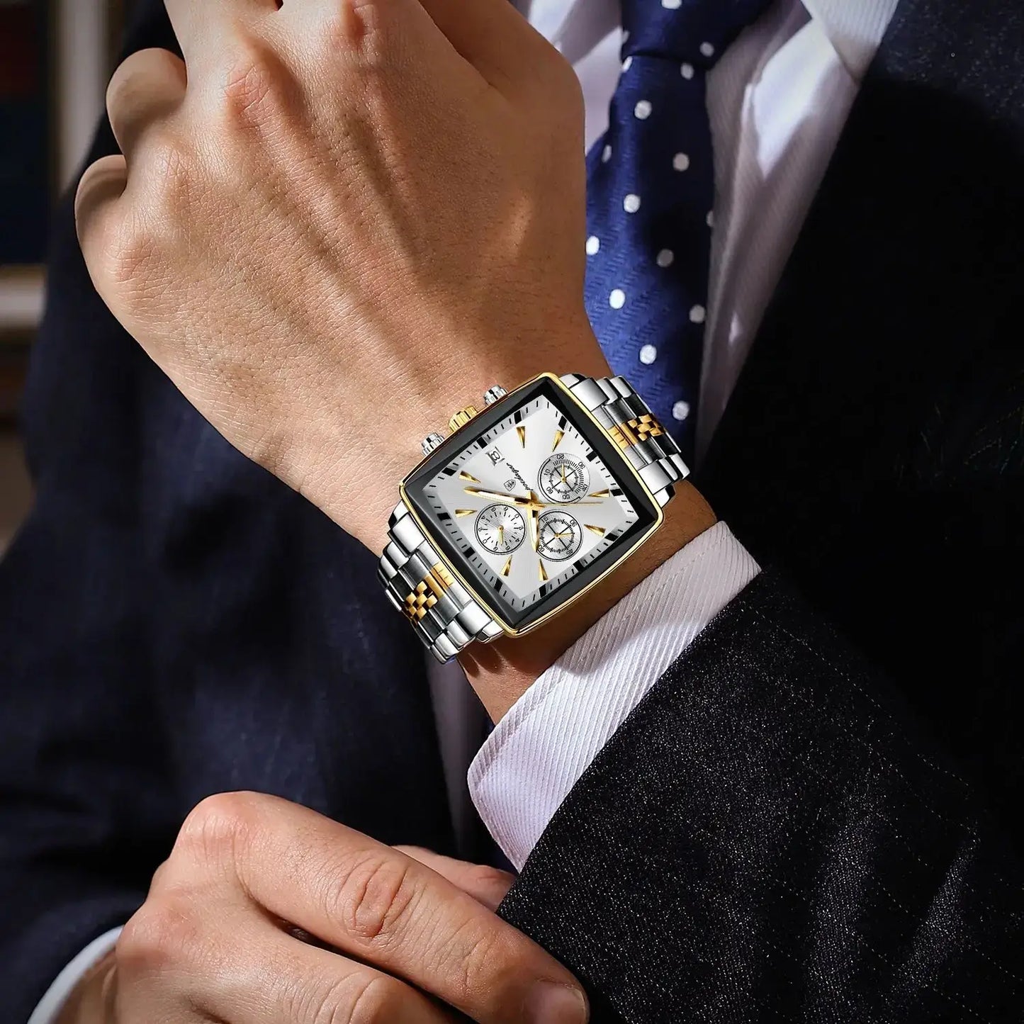 POEDAGAR luxury square sport wristwatch on a man's wrist, showcasing a stainless steel design and luminous chronograph features.