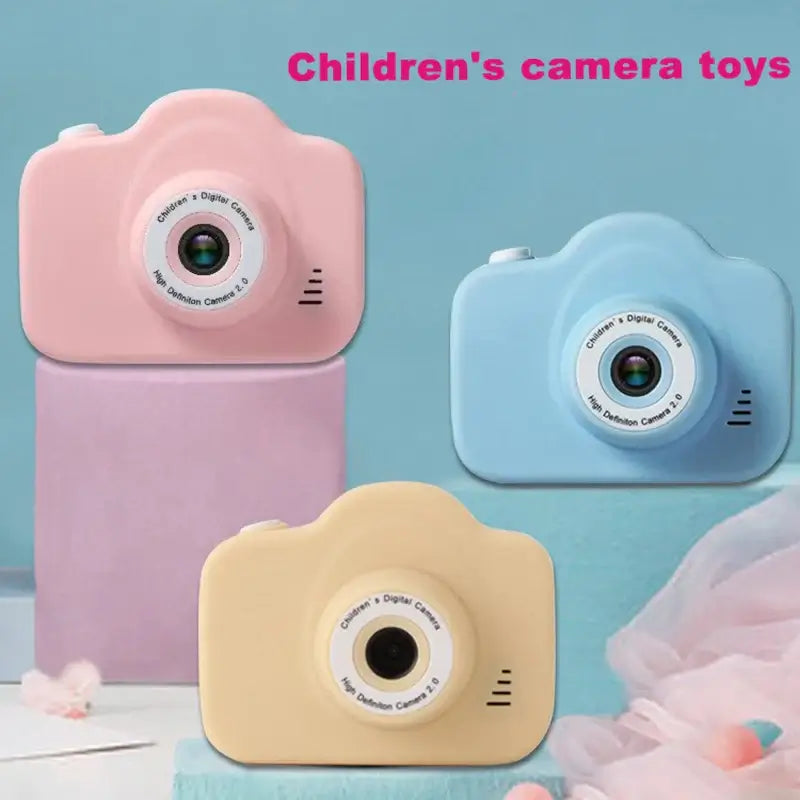 Colorful children's digital cameras in pink, blue, and yellow, perfect for kids' birthdays and photography fun.