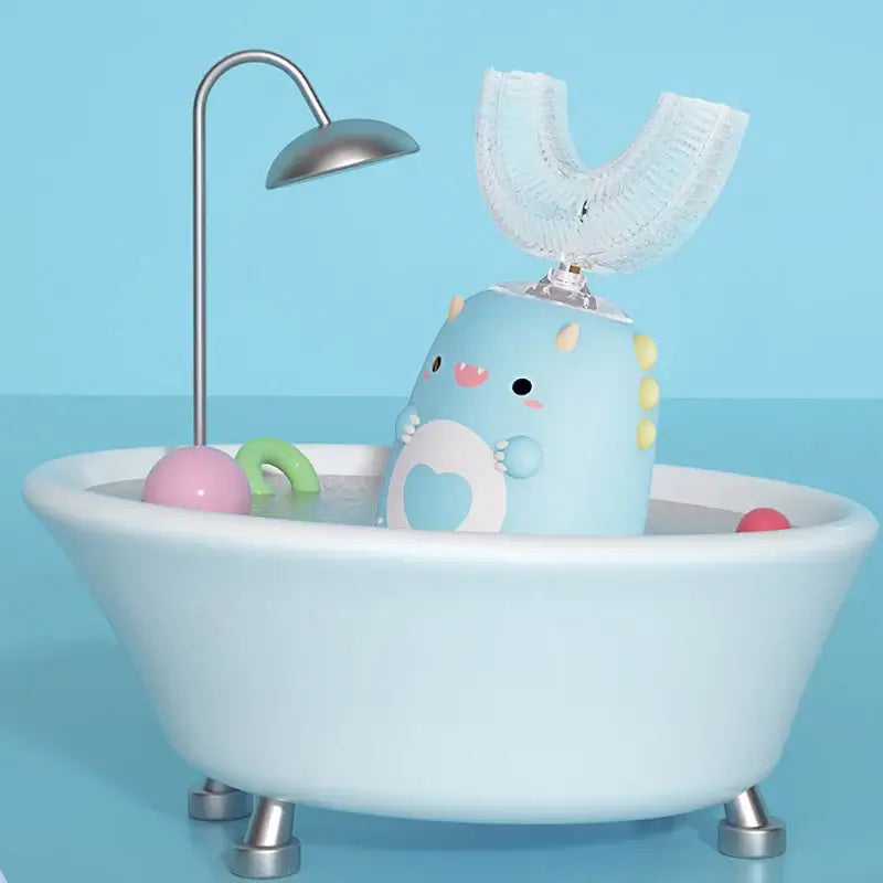 Cute U-shaped kids toothbrush in a playful blue bath scene, designed for fun and effective teeth cleaning.