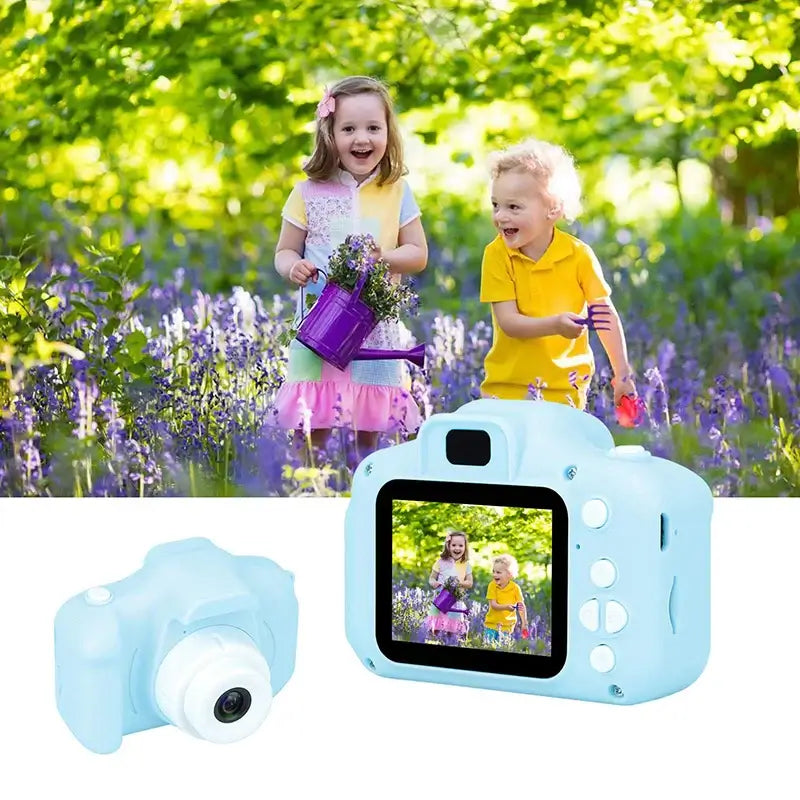 Kids using mini HD digital camera toy in a garden, with image displayed on camera screen. Ideal Christmas gift for children.