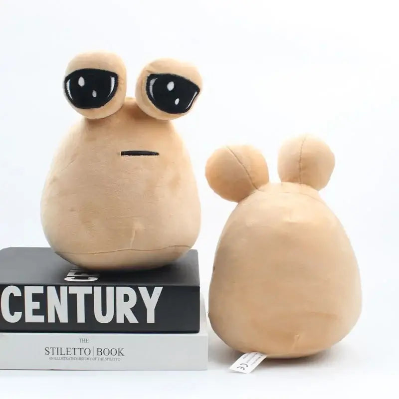 Plush snail toy doll with large eyes sitting on books, made of plush material and filled with PP cotton, ideal for kids and gifts.