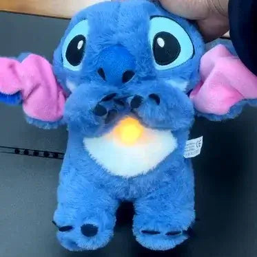 Blue Stitch plush doll with glowing light, pink ears, and large eyes, designed as a soothing toy for kids.