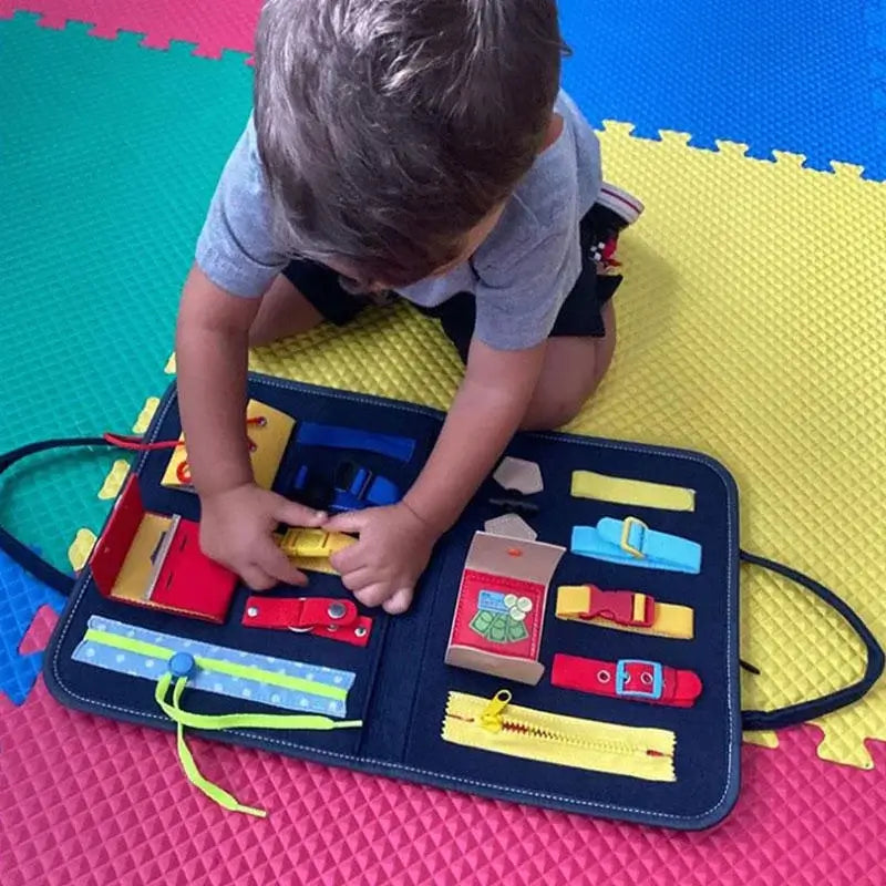 Child playing with Montessori fine motor skills training toy on colorful mat.