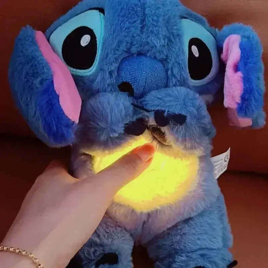 Close-up of a Lilo & Stitch plush toy with a glowing tummy, perfect for cuddles and nighttime comfort.