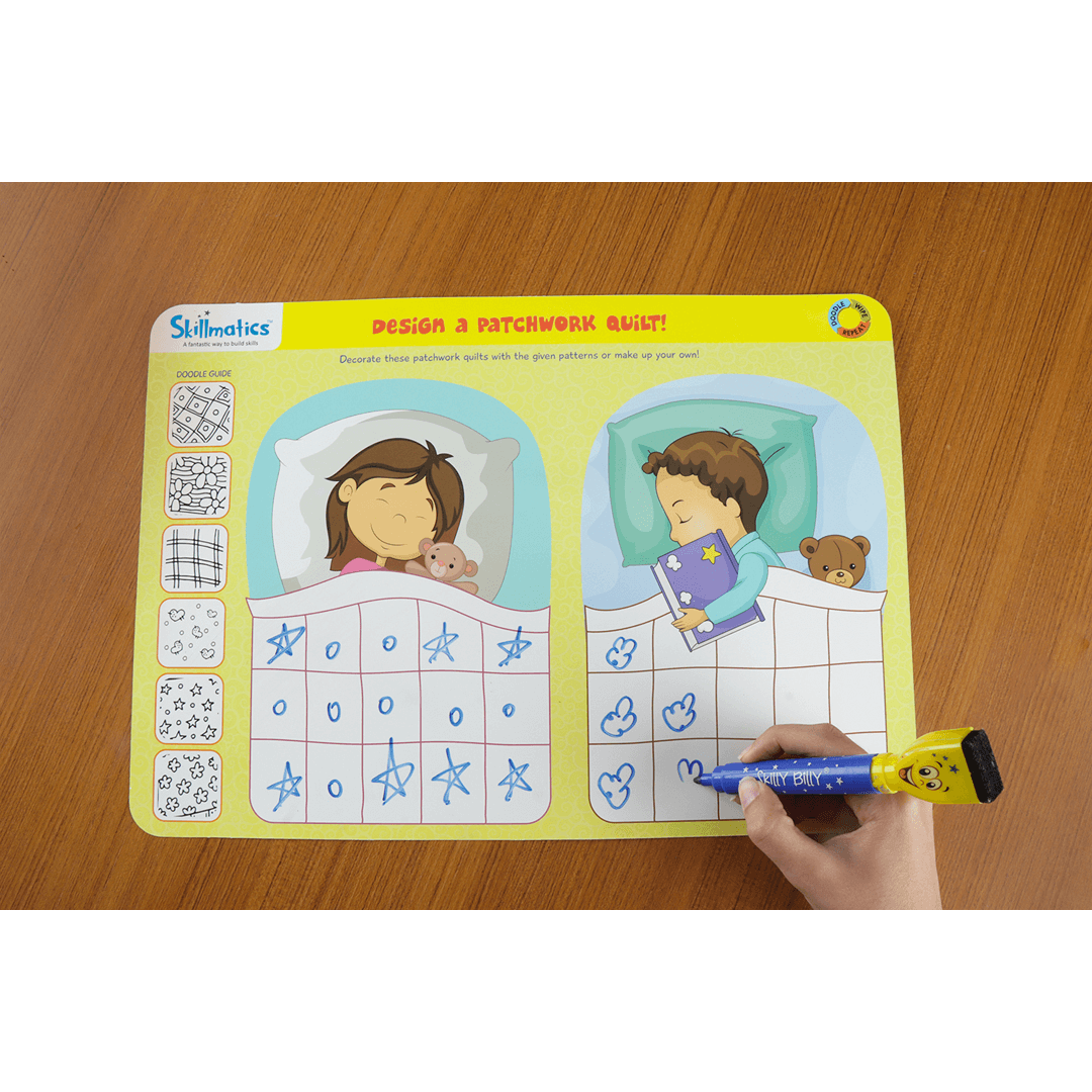 Child using Skillmatics Doodle and Draw activity mat with Skilly Billy marker for creative learning and designing quilts.