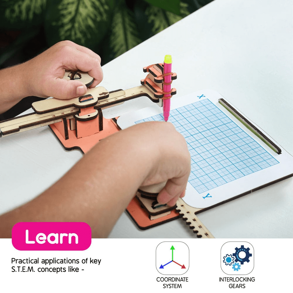 Child using STEM building toy sketching machine with gears and coordinate system for educational play.