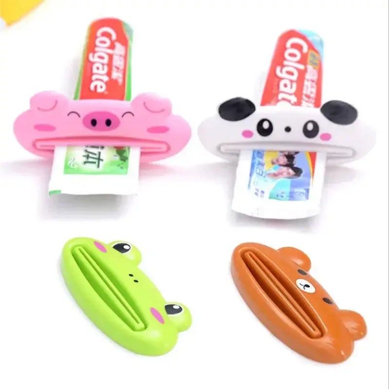 Colorful cartoon toothpaste squeezers featuring a pig, panda, frog, and bear designs for fun bathroom organization.