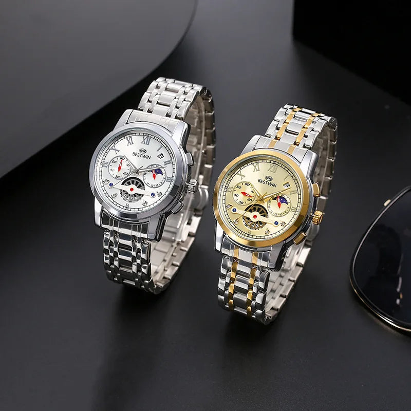 Luxury men's watch with moon phase, BESTWIN 926 in silver and gold finishes on a table.