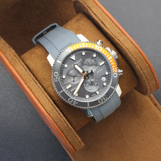 T-Star T120.417 watch with a liquid silicone strap, satin middle effect, displayed on a soft cushion.