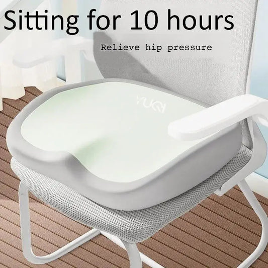 Ergonomic memory foam seat cushion designed to relieve hip pressure for prolonged sitting in car or office.