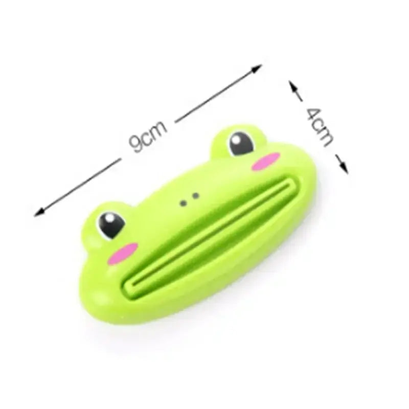 Cartoon frog toothpaste squeezer in green, measuring 9cm x 4cm, perfect for kitchen and bathroom use.