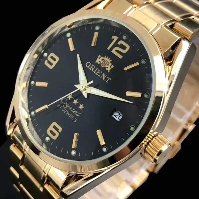 Orient luxury automatic mechanical watch with gold-tone steel band and black dial, featuring multi-function capabilities.
