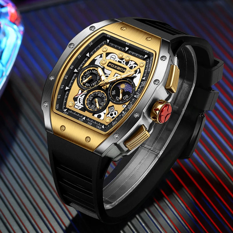 FOXBOX luxury men's chronograph watch with gold bezel and silicone strap on a stylish background.